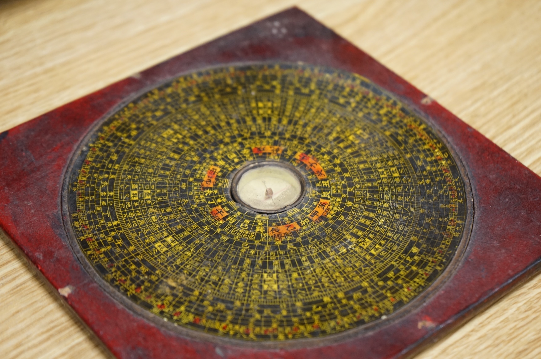 A Regency Morocco leather sewing and writing casket, 26cm and a Chinese Feng shui compass